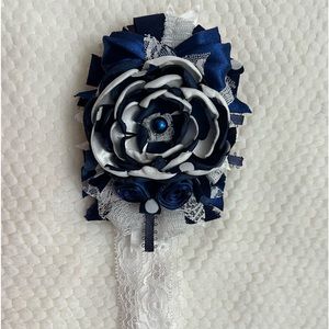 Med 3.5”x5”little girl navy flower headband.